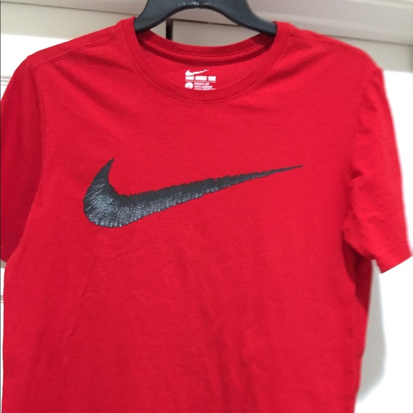 red and gray nike shirt